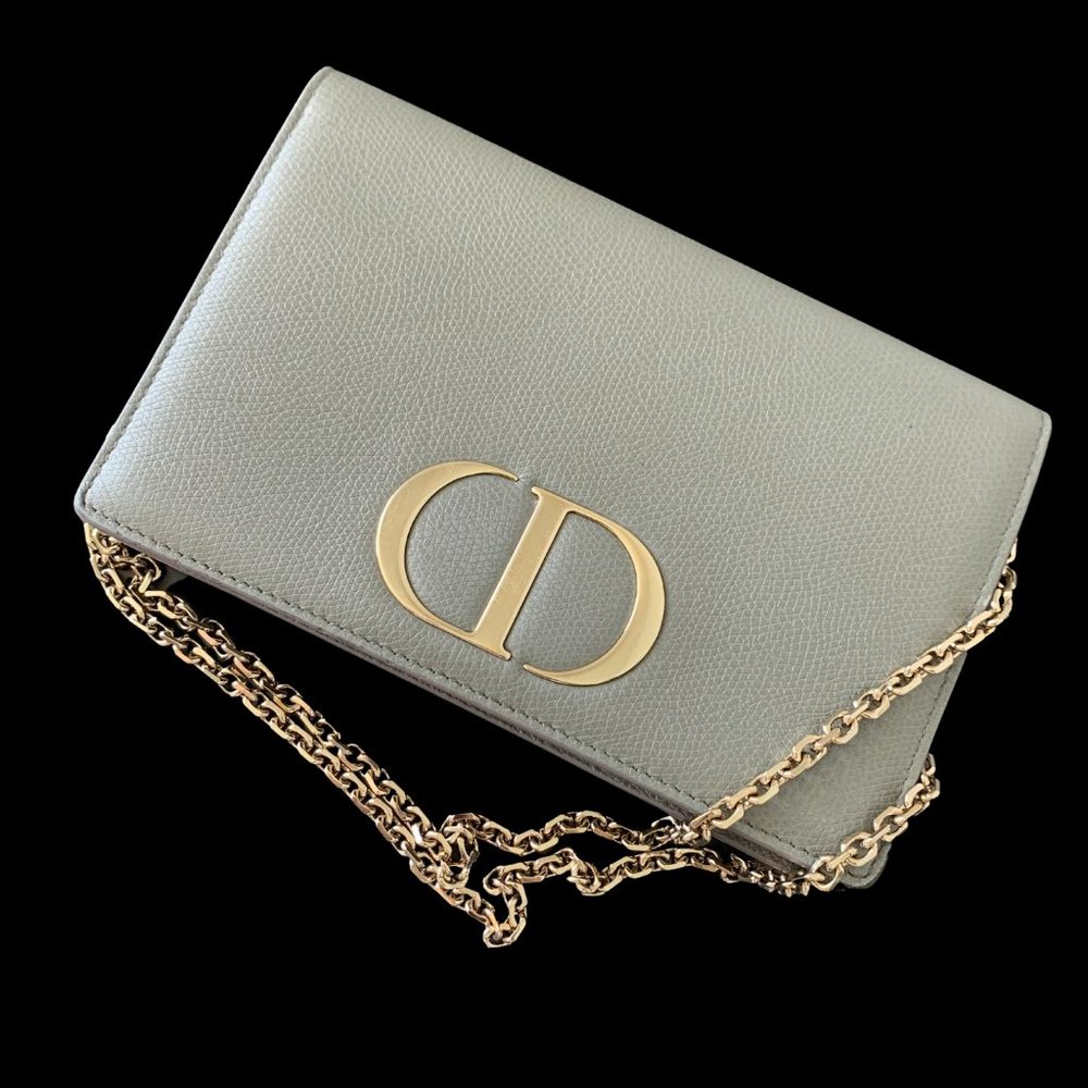 Dior clutch bag, silver color with gold chain